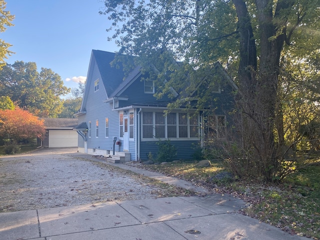 view of property exterior featuring a garage