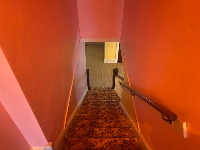 stairs with tile patterned flooring