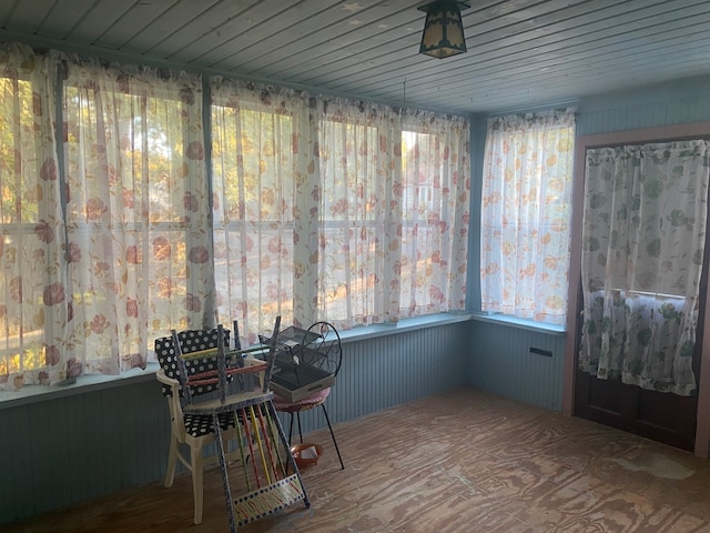 unfurnished sunroom featuring plenty of natural light