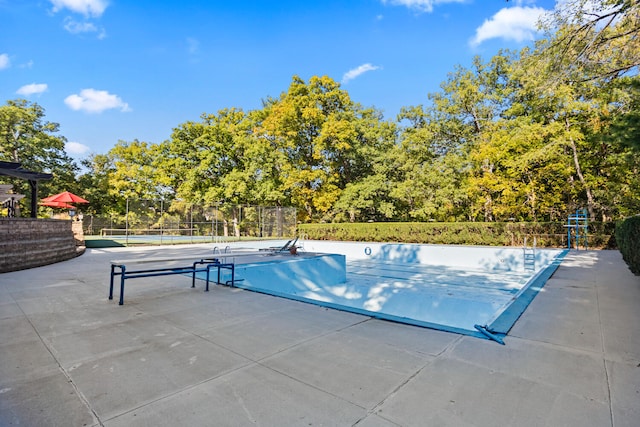 27 Hickory Ln, White Heath, IL 61884 - view of swimming pool featuring a tennis court