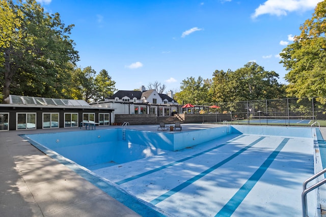 27 Hickory Ln, White Heath, IL 61884 - view of swimming pool featuring a tennis court