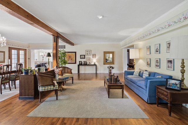 27 Hickory Ln, White Heath, IL 61884 - living room with ornamental molding, wood finished floors, a chandelier, and beamed ceiling