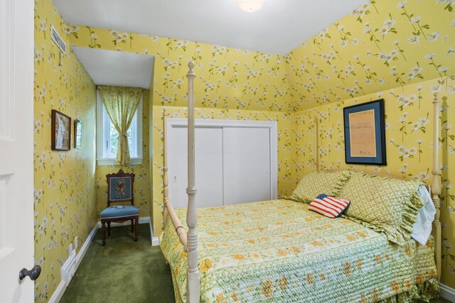 27 Hickory Ln, White Heath, IL 61884 - carpeted bedroom featuring wallpapered walls and a closet
