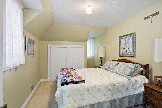 27 Hickory Ln, White Heath, IL 61884 - carpeted bedroom featuring baseboards and a closet