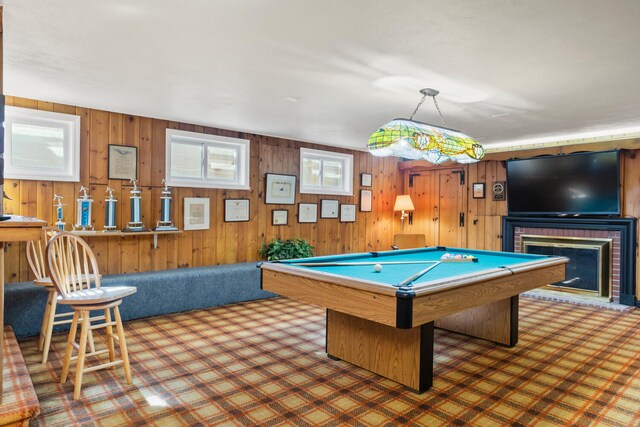 27 Hickory Ln, White Heath, IL 61884 - playroom featuring carpet flooring, a brick fireplace, billiards, and wood walls