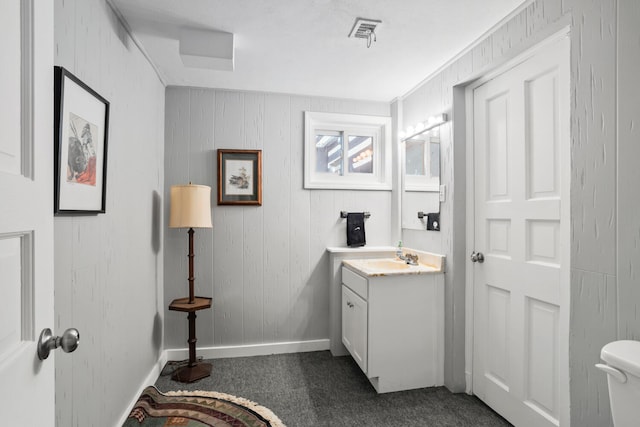 27 Hickory Ln, White Heath, IL 61884 - bathroom with vanity and baseboards
