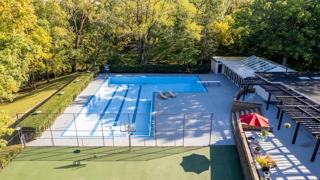 27 Hickory Ln, White Heath, IL 61884 - view of tennis court with a wooded view