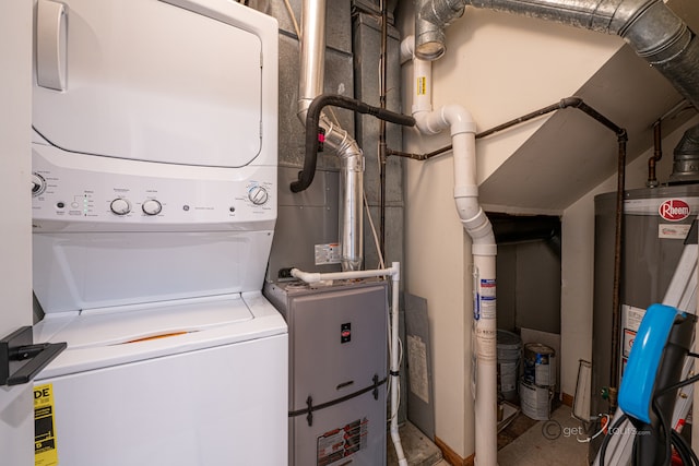 laundry area featuring stacked washer and clothes dryer and water heater