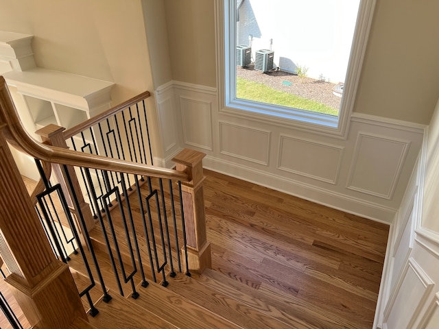 staircase featuring hardwood / wood-style flooring