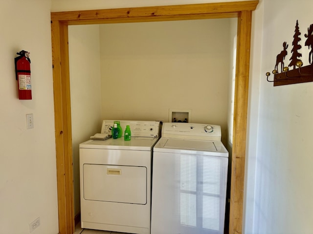 laundry area featuring washing machine and dryer