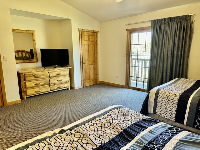 carpeted bedroom with lofted ceiling and access to exterior