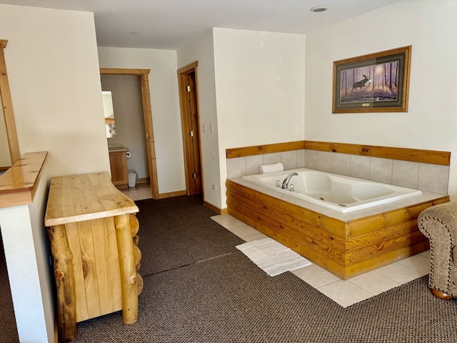 bathroom with tiled bath