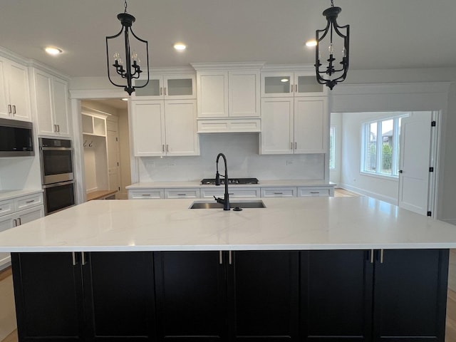 8673 High Stone Way, Frankfort, IL 60423 - kitchen featuring decorative backsplash, stainless steel appliances, white cabinetry, and glass insert cabinets