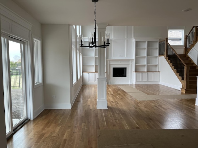 8673 High Stone Way, Frankfort, IL 60423 - stairs featuring a glass covered fireplace and wood finished floors