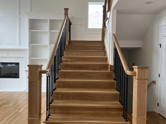 8673 High Stone Way, Frankfort, IL 60423 - stairway featuring ornate columns and wood finished floors