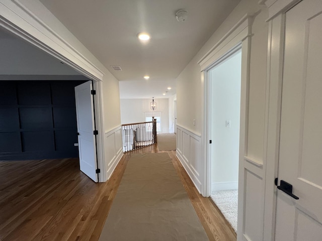 8673 High Stone Way, Frankfort, IL 60423 - unfurnished room featuring ceiling fan, baseboards, a raised ceiling, and light wood-style floors