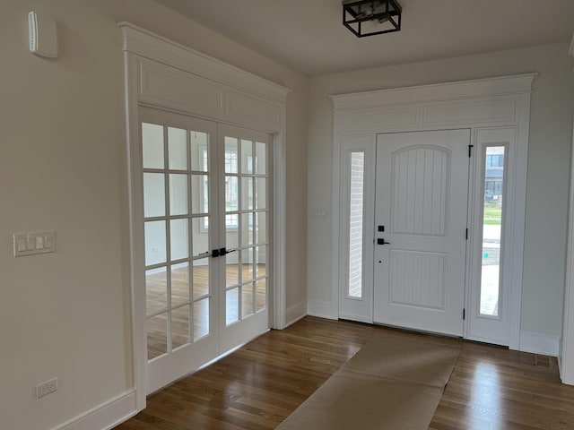 8673 High Stone Way, Frankfort, IL 60423 - spare room with visible vents, dark wood-style flooring, baseboards, ceiling fan, and french doors