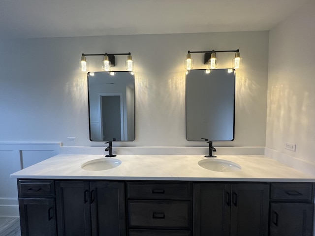 8673 High Stone Way, Frankfort, IL 60423 - full bathroom featuring a freestanding bath, wainscoting, a sink, marble finish floor, and a decorative wall