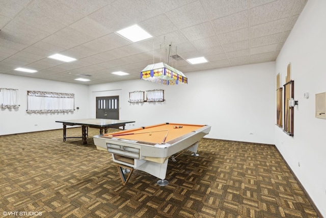 playroom featuring dark parquet flooring, a paneled ceiling, and billiards