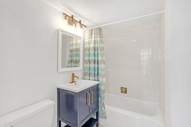 full bathroom with vanity, toilet, and shower / tub combo with curtain