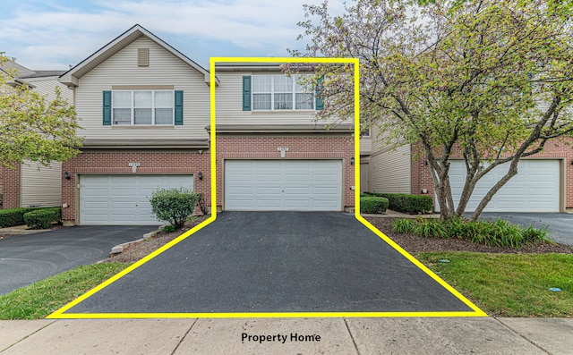 view of property with a garage