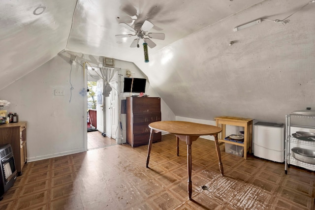 bonus room featuring heating unit, vaulted ceiling, ceiling fan, and parquet flooring