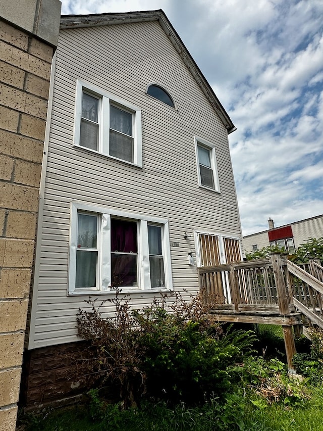 rear view of property with a deck