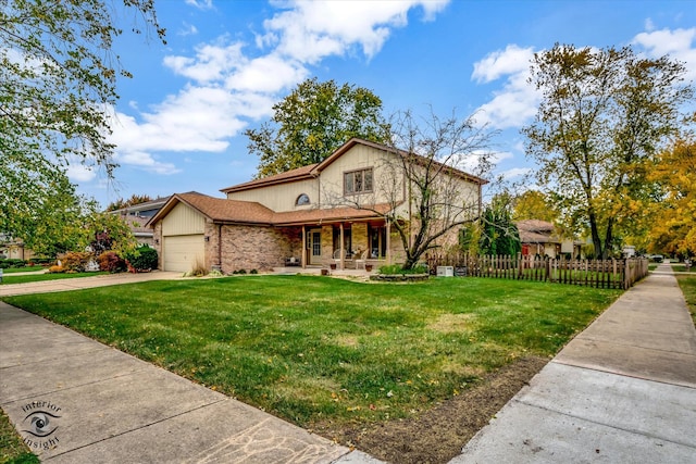 front of property with a front yard and a garage