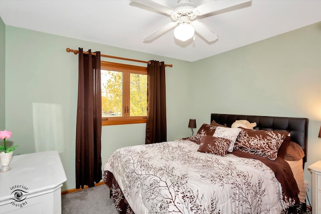 bedroom featuring ceiling fan and carpet