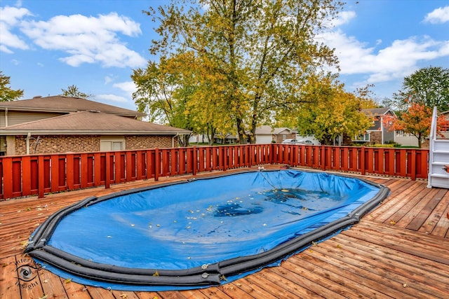 view of pool with a deck