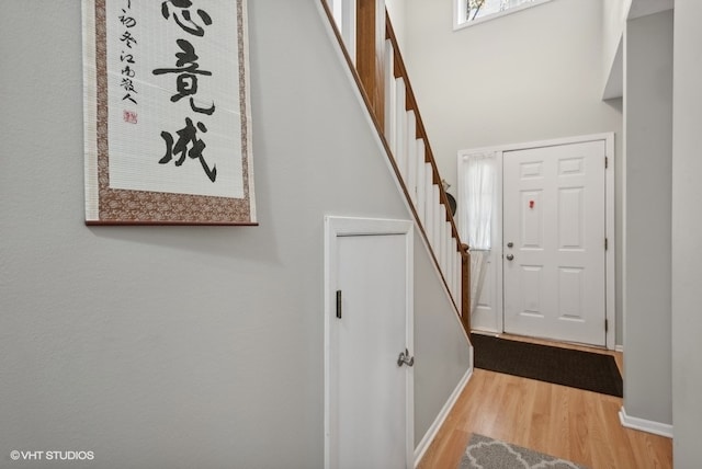 entrance foyer with light wood-type flooring