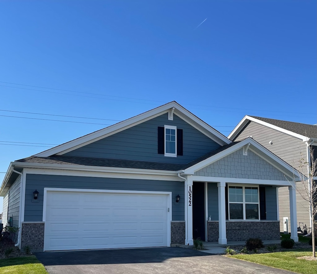 craftsman house with a garage