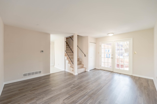 unfurnished room featuring wood-type flooring