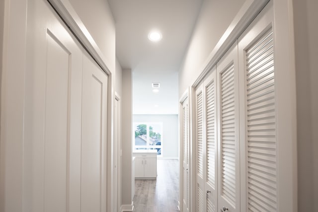 hall featuring hardwood / wood-style floors