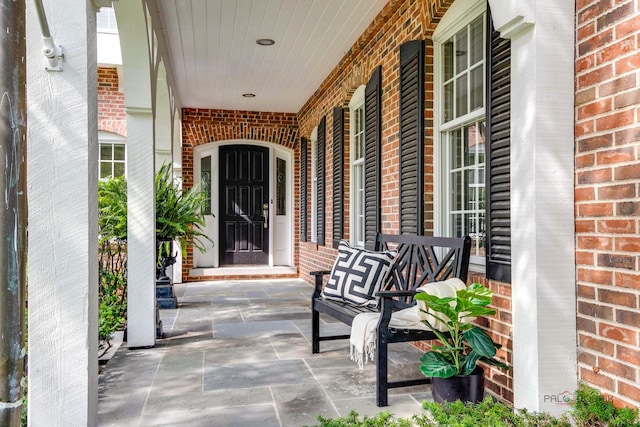 doorway to property with covered porch