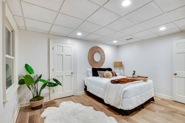 bedroom featuring wood-type flooring