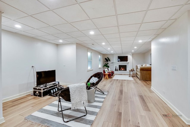 interior space with a large fireplace and light wood-type flooring