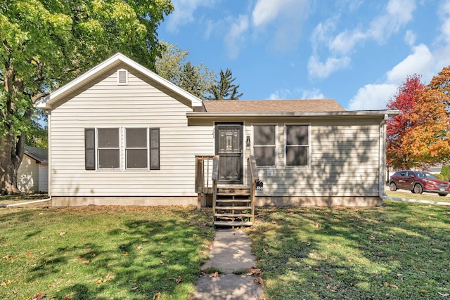 view of front of home with a front yard