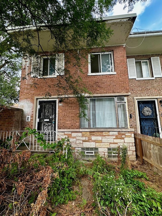 8338 S Ingleside Ave, Chicago, IL 60619 - view of front of home featuring fence and brick siding