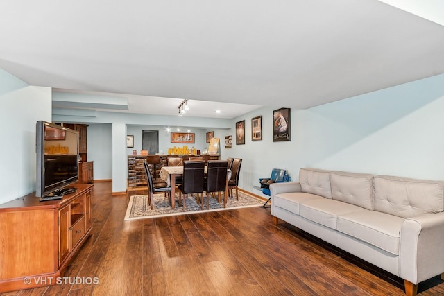 living room featuring dark hardwood / wood-style floors