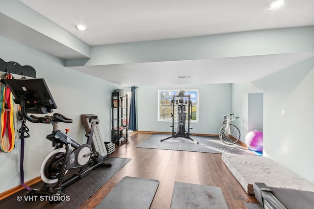 exercise room featuring hardwood / wood-style flooring