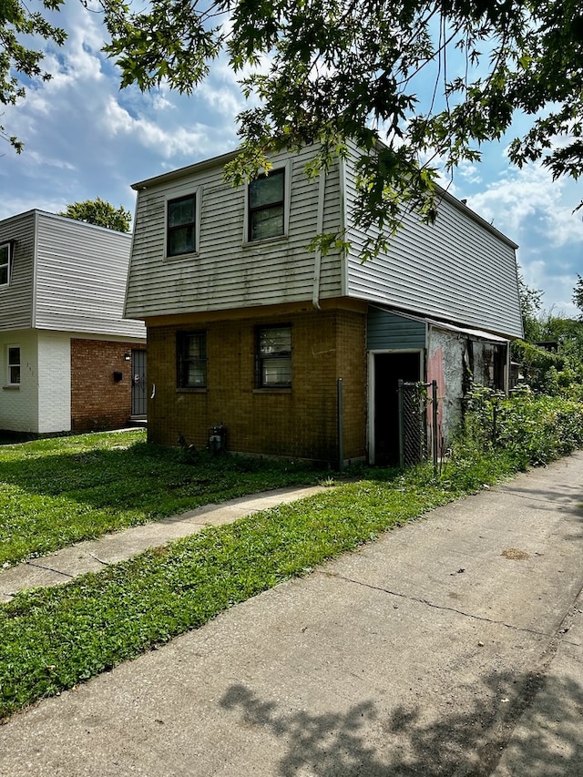 exterior space with a front yard