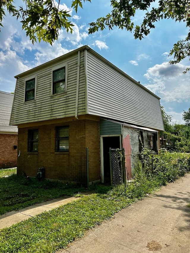 355 W 105th Pl, Chicago, IL 60628 - view of side of property with brick siding