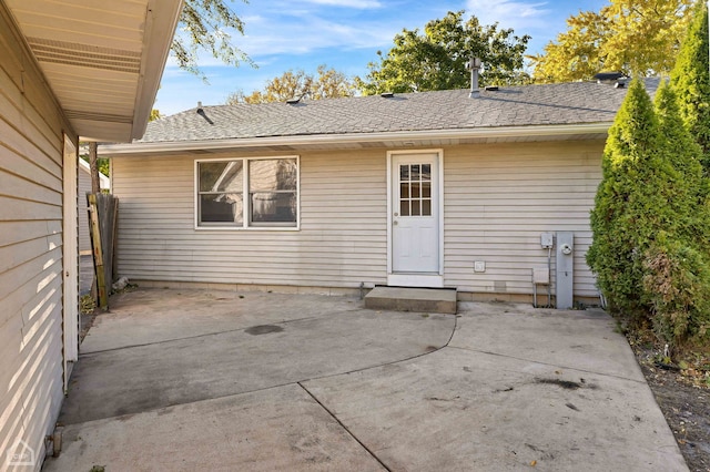 back of house with a patio