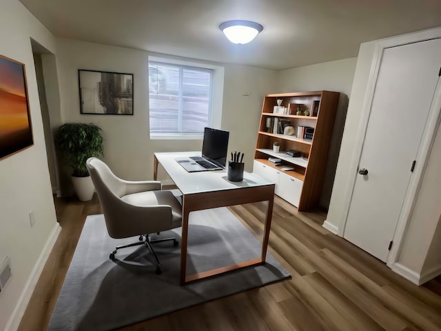 office space featuring dark wood-type flooring