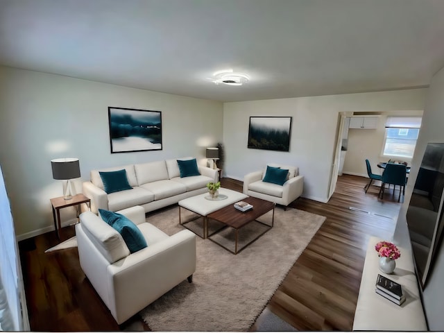 living room with dark hardwood / wood-style floors