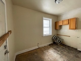 washroom featuring cabinets