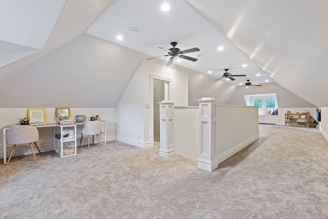 additional living space featuring light carpet, vaulted ceiling, and recessed lighting