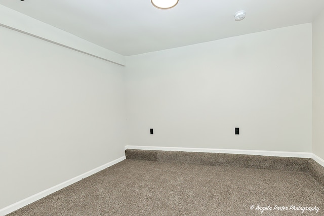 unfurnished room with carpet