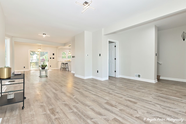 living room featuring light wood-type flooring